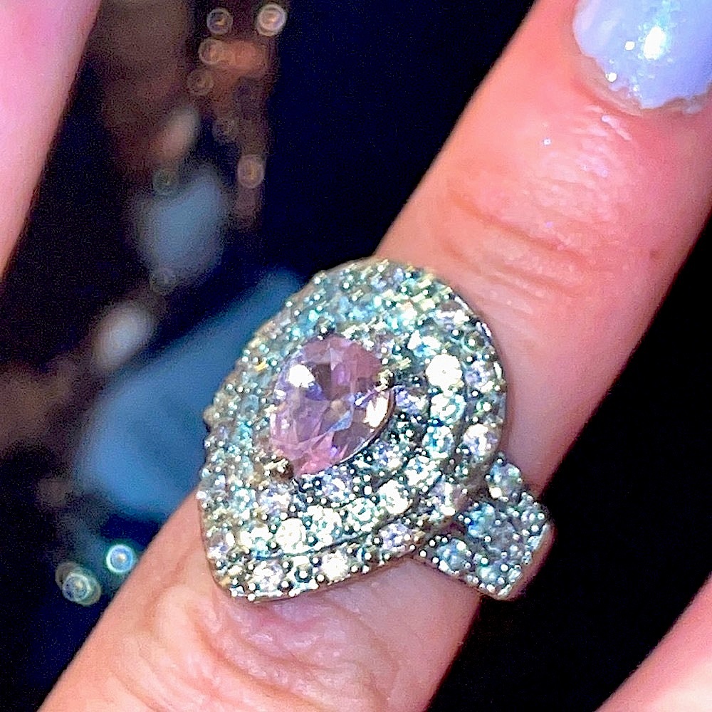 Size 5.5 Costume Ring, Huge in comparison , CZs surround a Mini Pink Solitaire